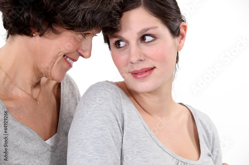 Mother and daughter looking at each other