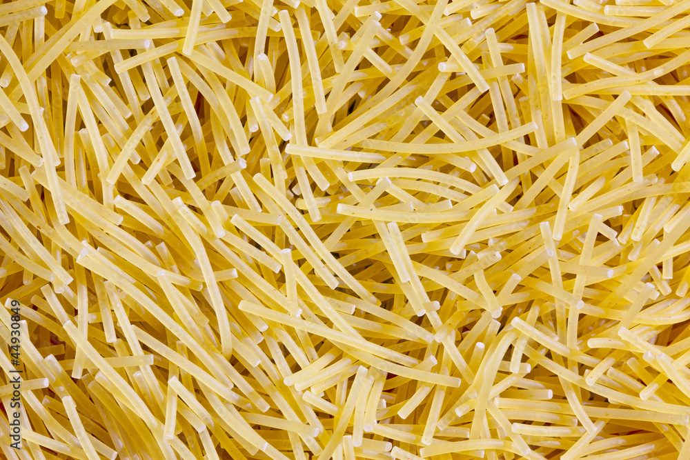 Raw noodles as background Raw noodles as background