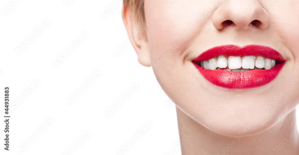 Fototapeta premium Young girl with snow-white smile. Red lipstick