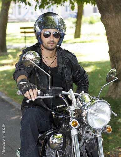 Motorcycle chopper rider with helmet