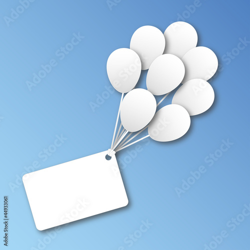 Label tied to balloons