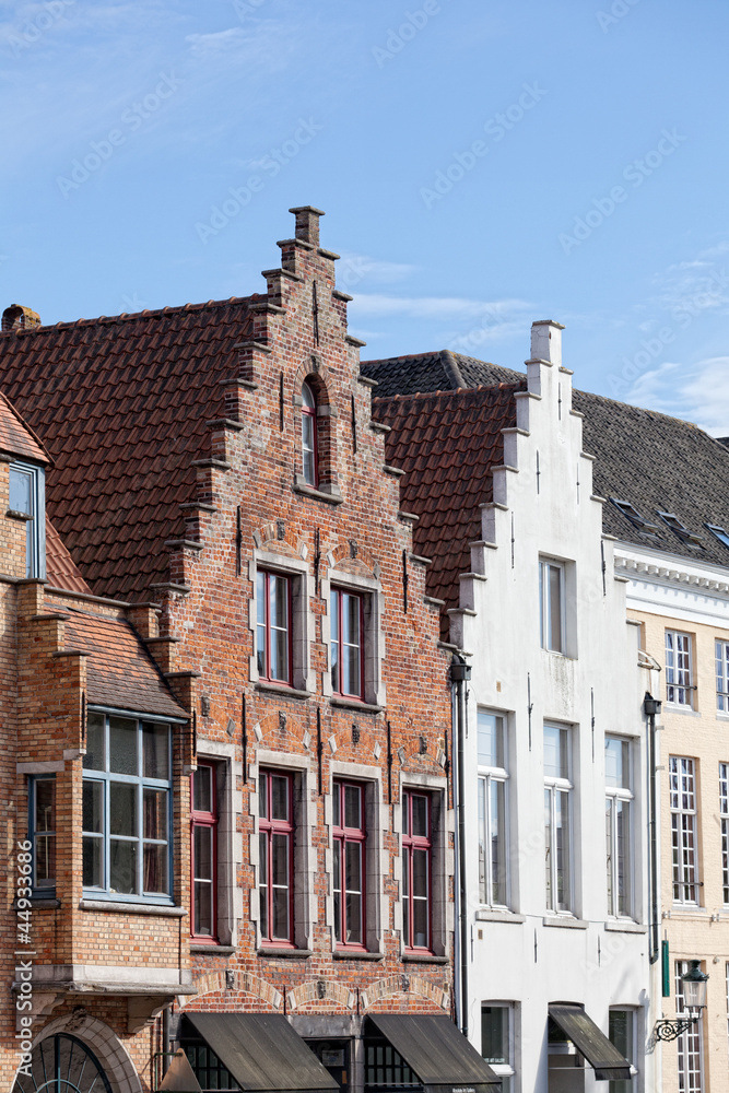Fototapeta premium European small street with old brick houses. Bruges. Belgium.