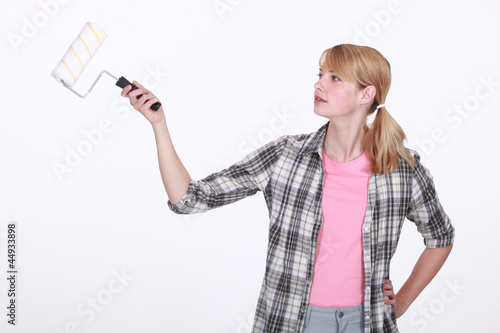 Woman with roller brush