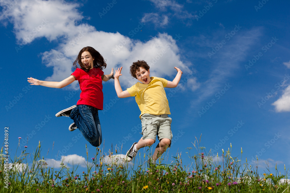 Girl and boy running, jumping outdoor Girl and boy running, jumping outdoor