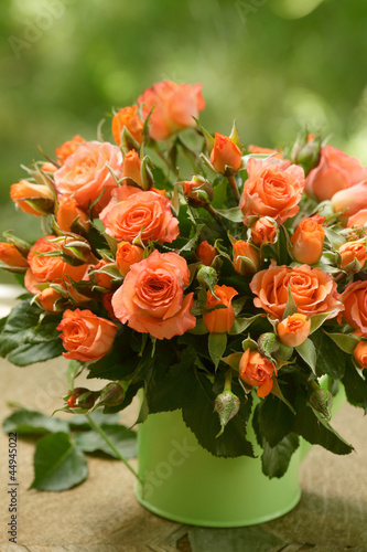 Wallpaper Mural Bunch of freshly picked pink roses in a pot / watering can Torontodigital.ca
