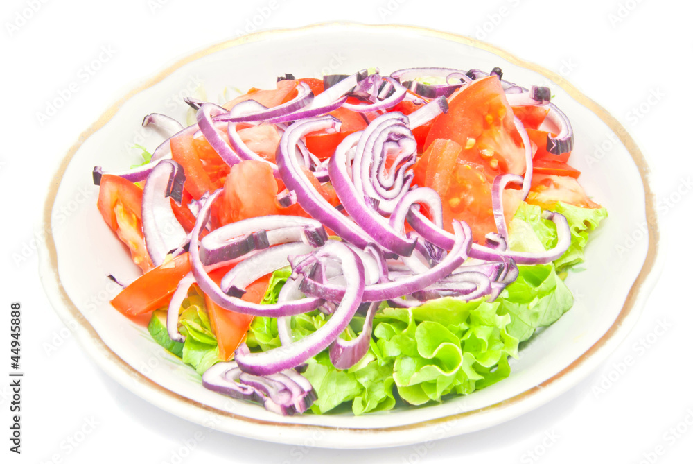 fresh salad in the plate on white fresh salad in the plate on white