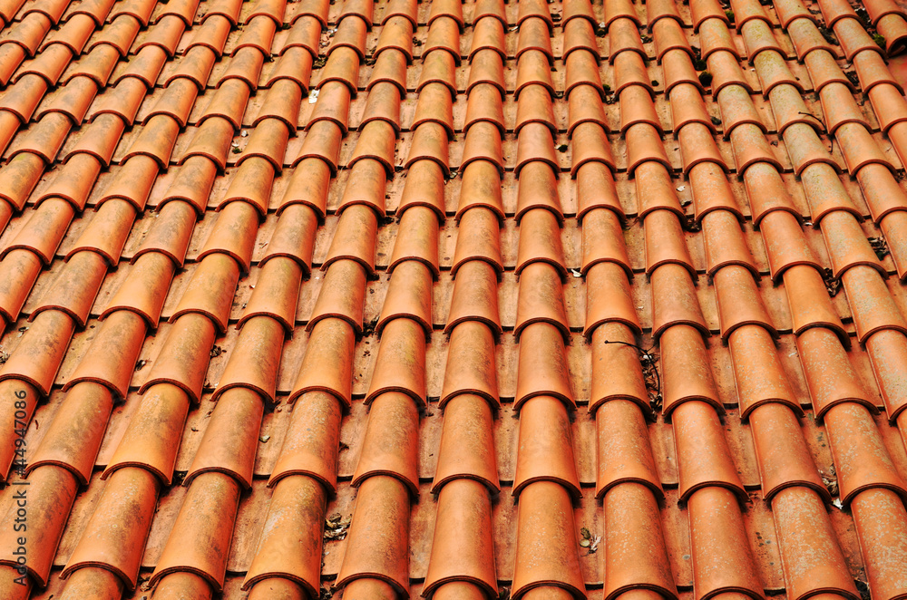 Background of clay round tiles covered roof Background of clay round tiles covered roof