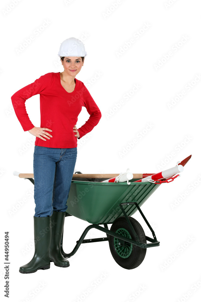Construction worker with a wheelbarrow Construction worker with a wheelbarrow