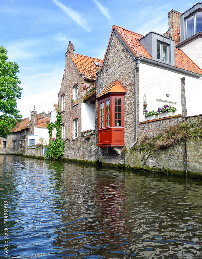 Old houses on the water in Bruges