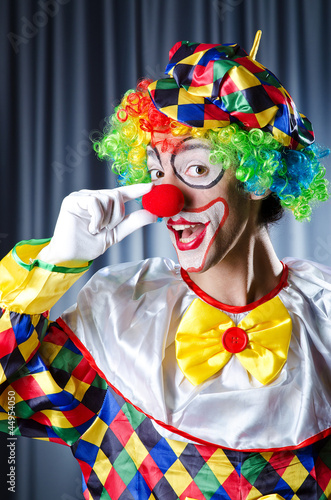 Funny clown in studio shooting