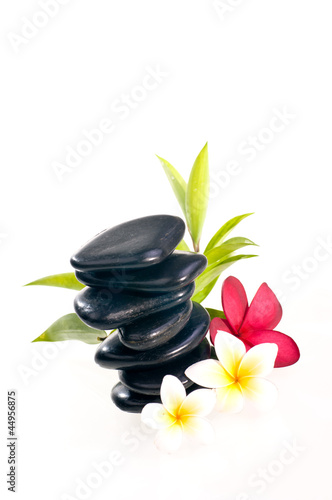 Black zen stone with frangipani flowers