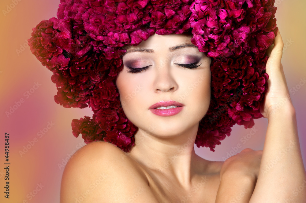 Portrait of beautiful girl with stylish makeup and bordo flowers
