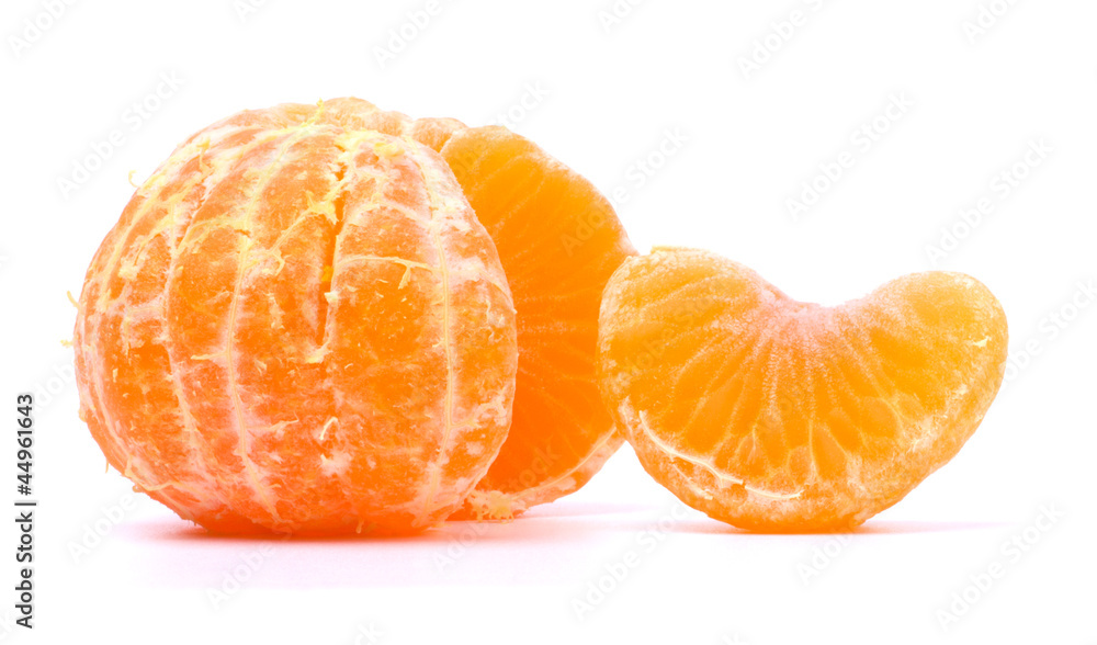 Peeled slices of tangerine on white Peeled slices of tangerine on white