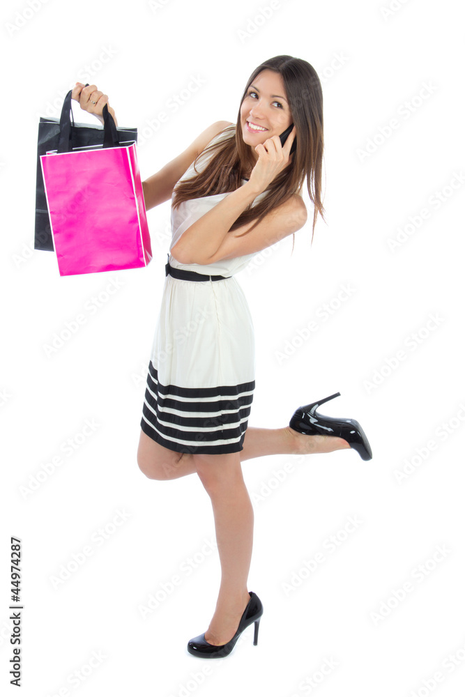 woman shopping bags after successful shopping, smiling and calli woman shopping bags after successful shopping, smiling and calli