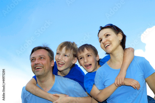 Smiling family having fun