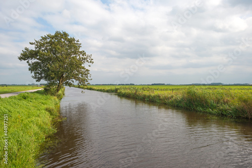Canal through a rural landscape