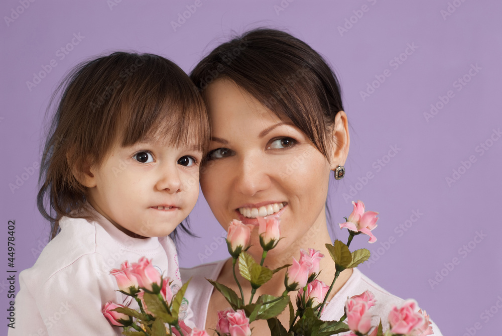 A beautiful nice Caucasian mother with her daughter A beautiful nice Caucasian mother with her daughter