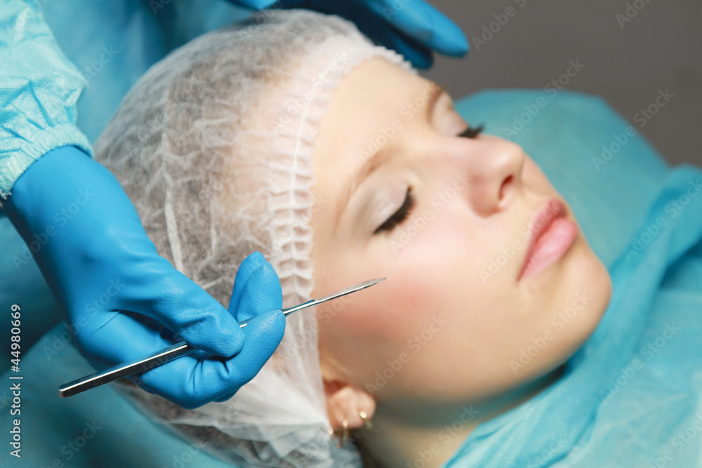 A woman receiving plastic operation A woman receiving plastic operation