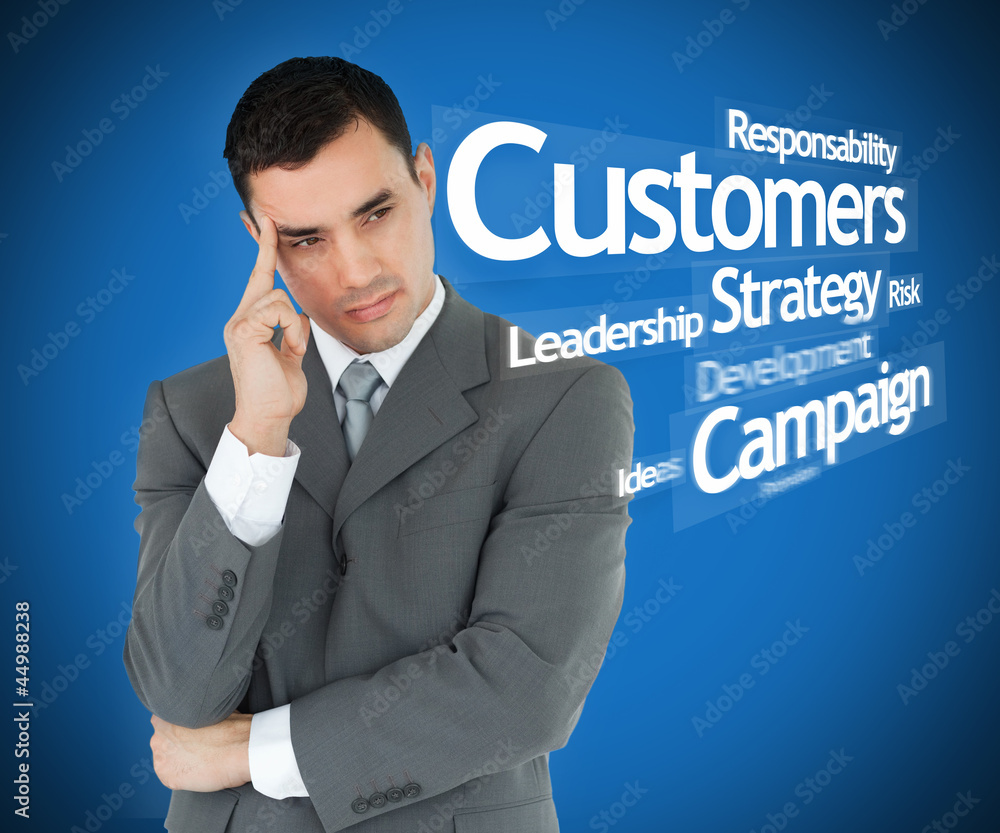 Businessman standing thinking blue background Businessman standing thinking blue background