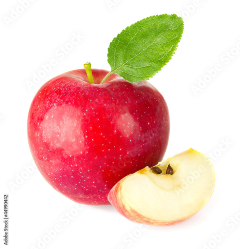 red apple with a quarter and green leaf