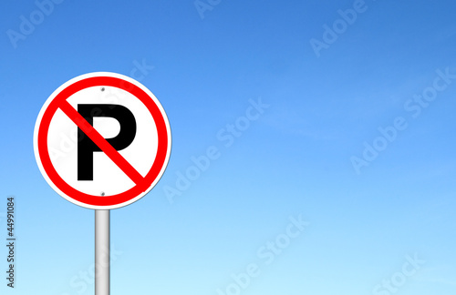 No parking sign over blue sky