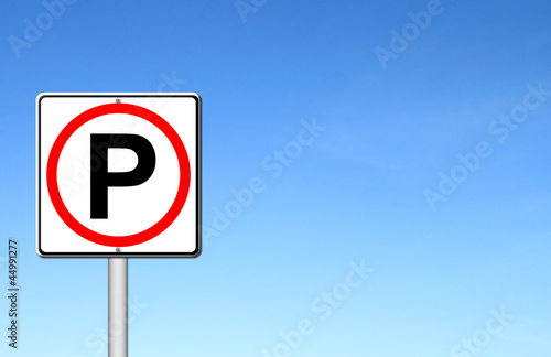 Parking sign over blue sky