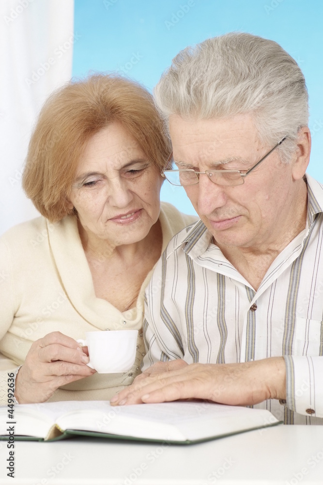 Lovely elderly couple resting at home Lovely elderly couple resting at home