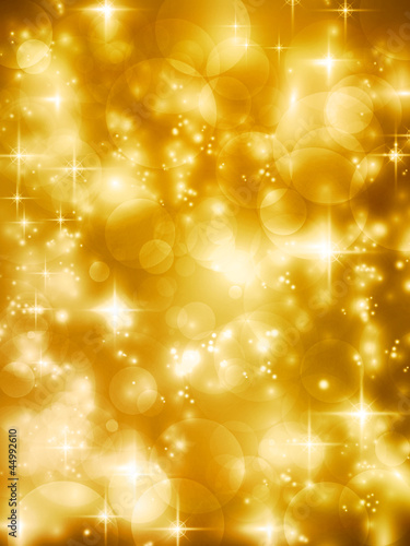 Festive golde bokeh lights vector background