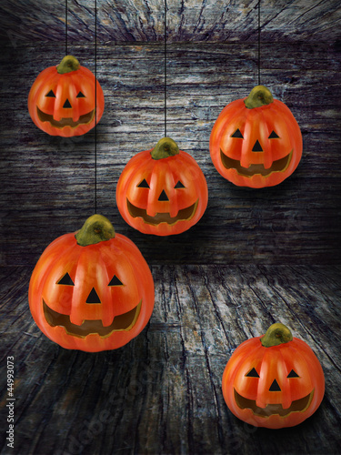 Much Halloween pumpkin in old antique dark room