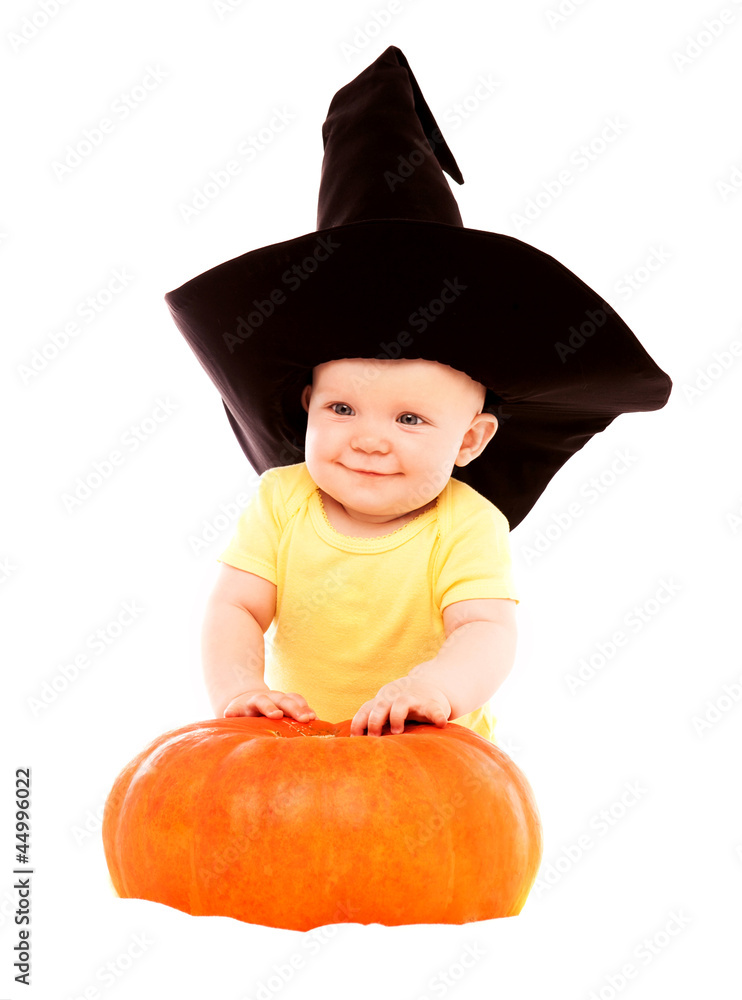 baby with a pumpkin