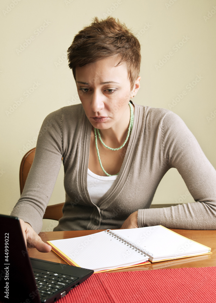 woman on her laptop woman on her laptop