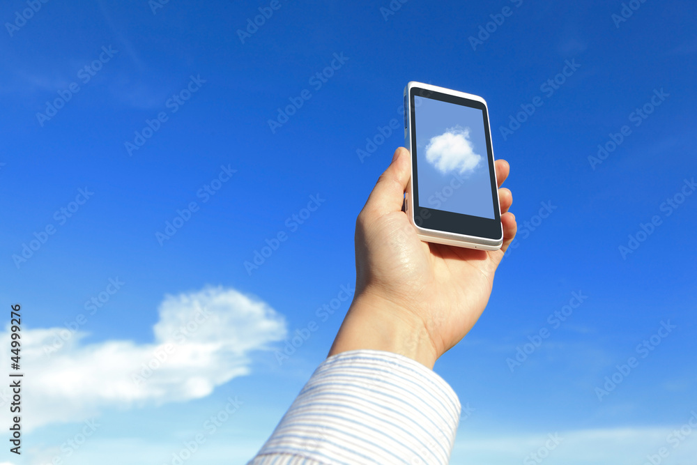 Business man holding mobile phone with cloud Business man holding mobile phone with cloud