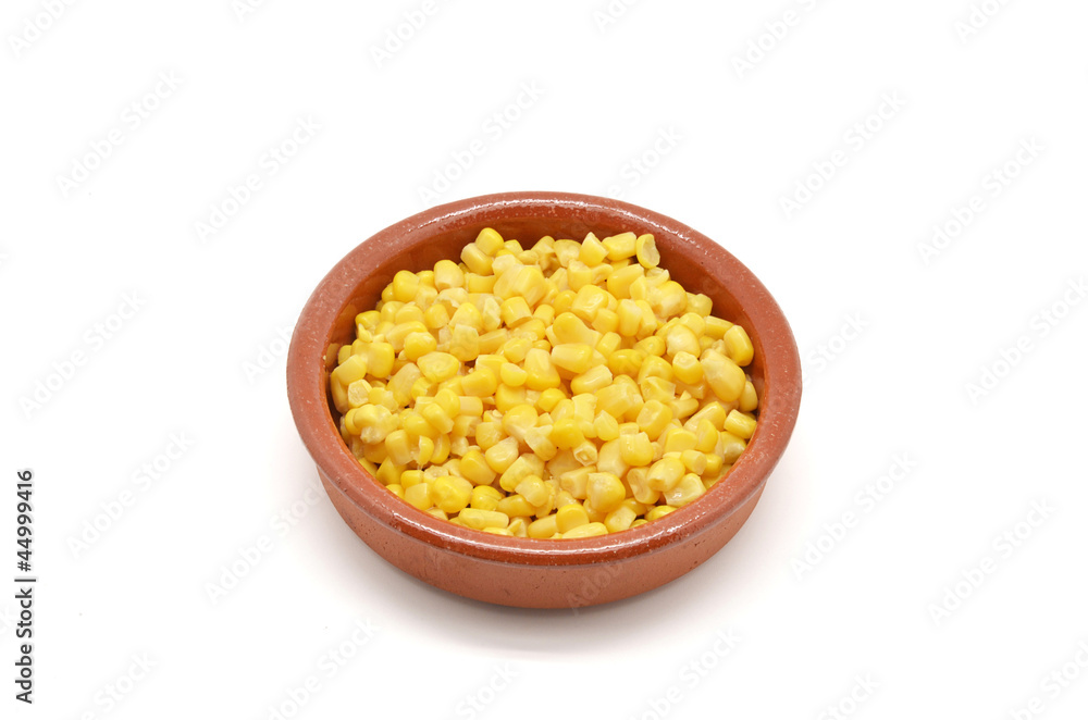 Sweet corn grains in wood bowl Sweet corn grains in wood bowl