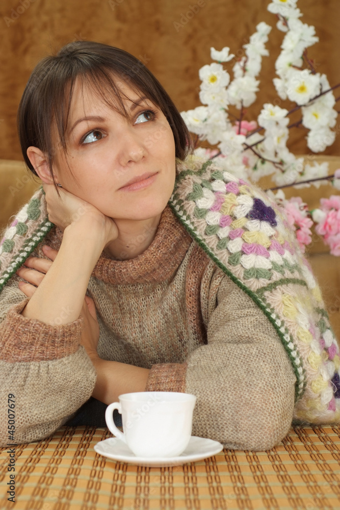 Pretty Caucasian woman on a sofa Pretty Caucasian woman on a sofa