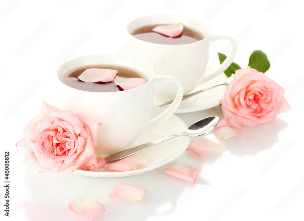 cups of tea with roses isolated on white cups of tea with roses isolated on white