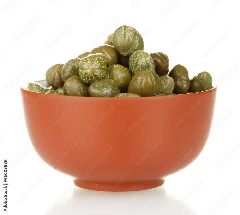 green capers in ceramical bowl isolated on white background green capers in ceramical bowl isolated on white background