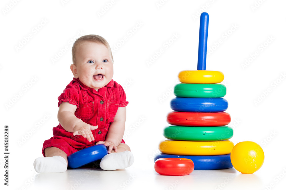 baby girl playing with big toy isolated on white background baby girl playing with big toy isolated on white background