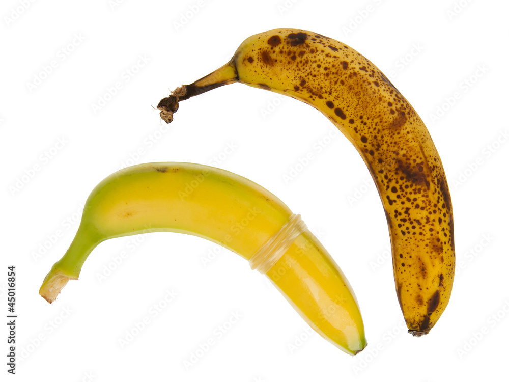 Healthy banana with condom and ugly banana without condom