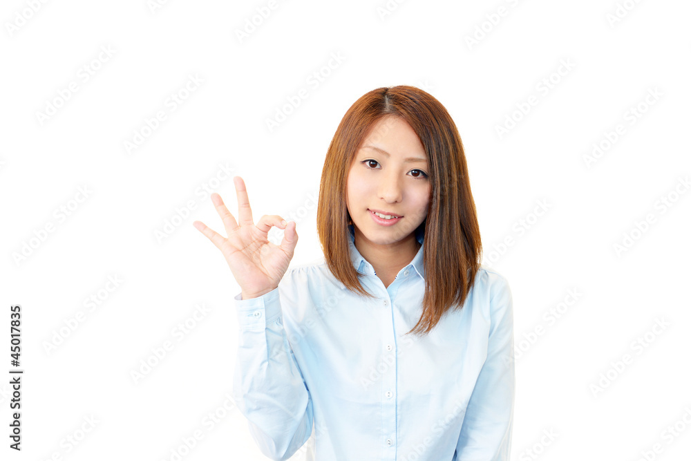 OKサインを出す笑顔のOL OKサインを出す笑顔のOL