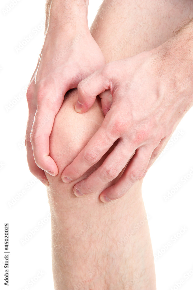 man holding sore knee, isolated on white man holding sore knee, isolated on white