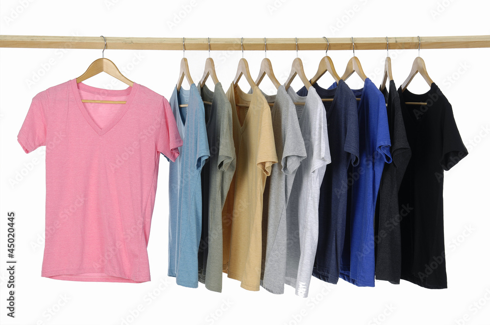 casual shirts on wooden hangers, isolated on white. casual shirts on wooden hangers, isolated on white.