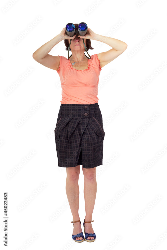 Woman looks through binoculars Woman looks through binoculars