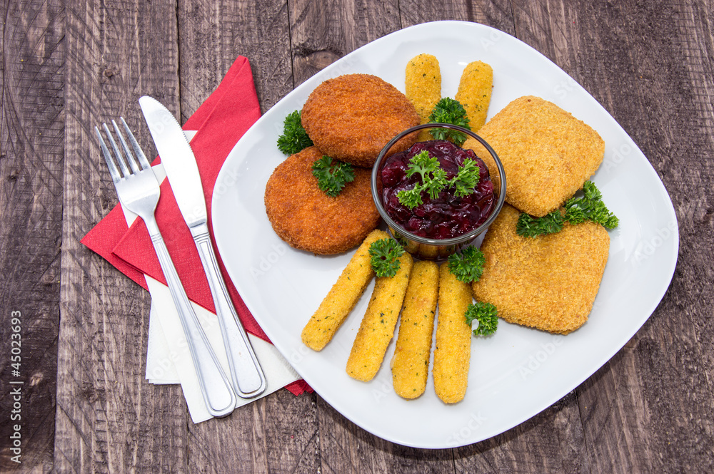 Pieces of fried Cheese on a plate Pieces of fried Cheese on a plate