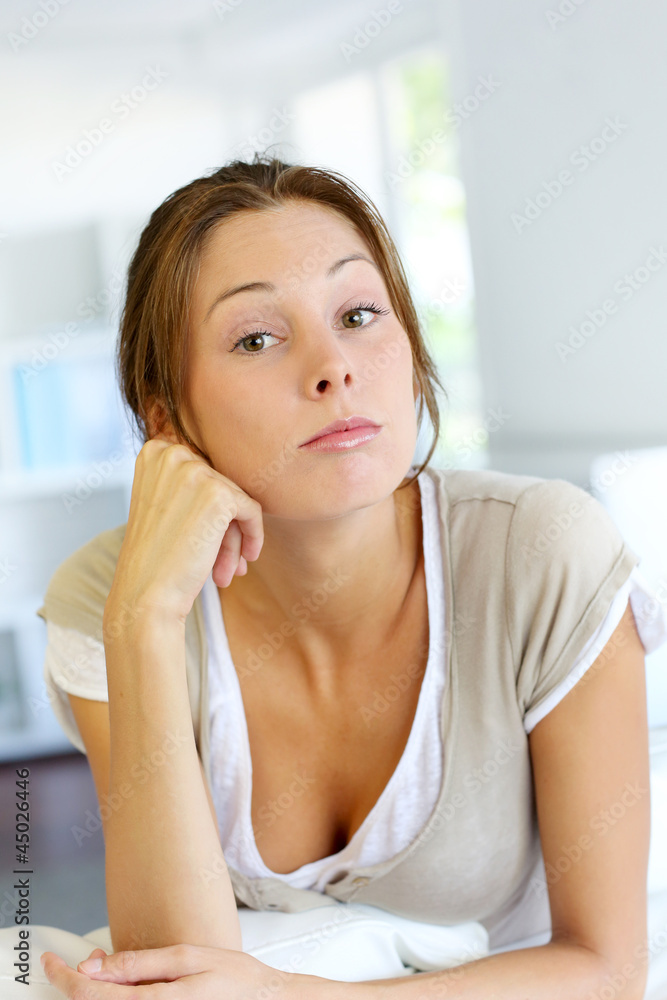 Closeup of young woman with upset look Closeup of young woman with upset look