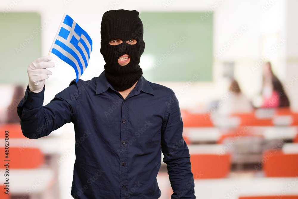 Portrait of a man wearing mask holding a flag Portrait of a man wearing mask holding a flag