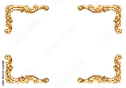 golden elements of carved frame on white