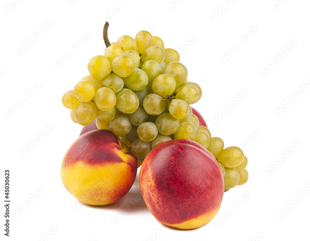 ripe peach with grapes isolated ripe peach with grapes isolated