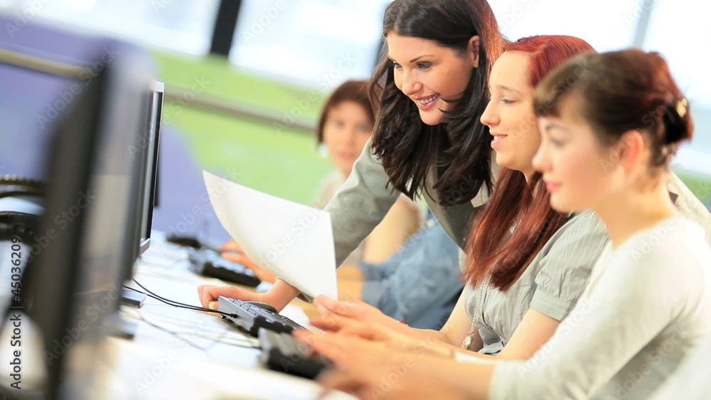 Tutor helping college classmates degree study Tutor helping college classmates degree study