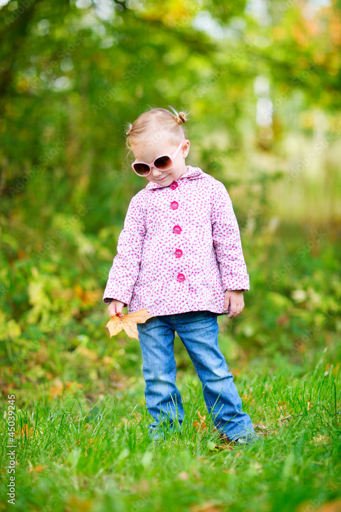 Cute girl in autumn park Cute girl in autumn park