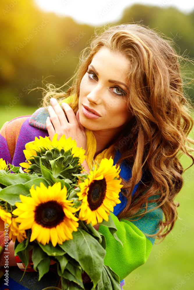Fashion woman walking in autumn park Fashion woman walking in autumn park
